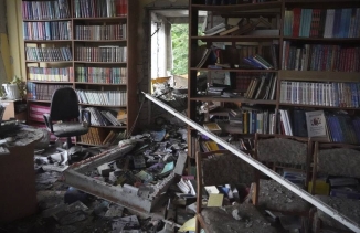 destroyed room with books